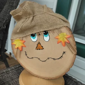 rustic wood slice scarecrow